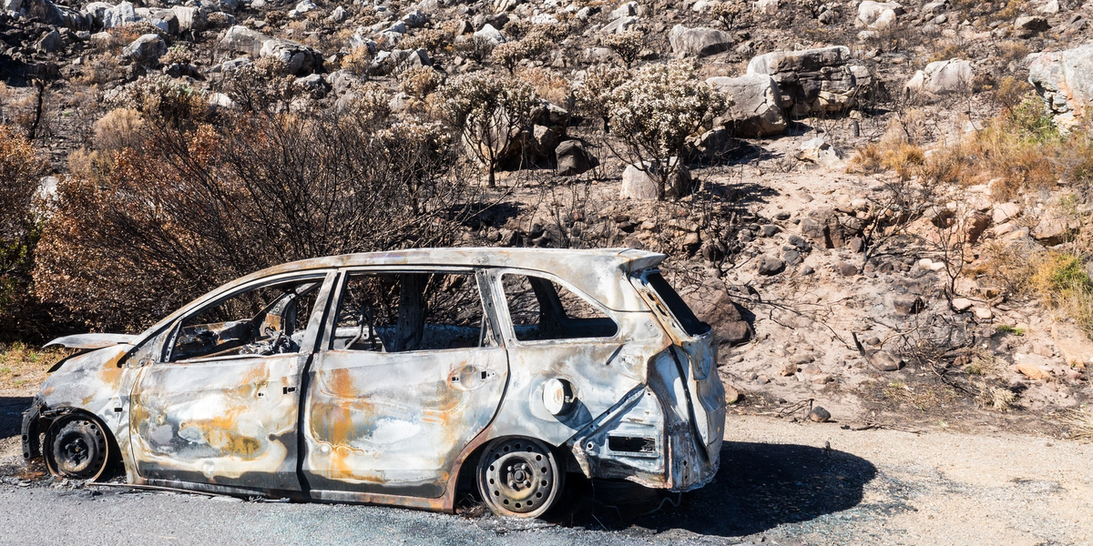 burned out car in the desert