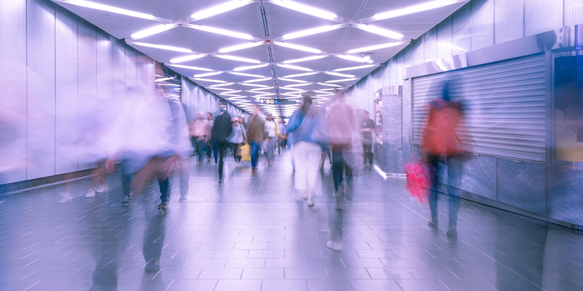 motion blur of people walking in an underground station